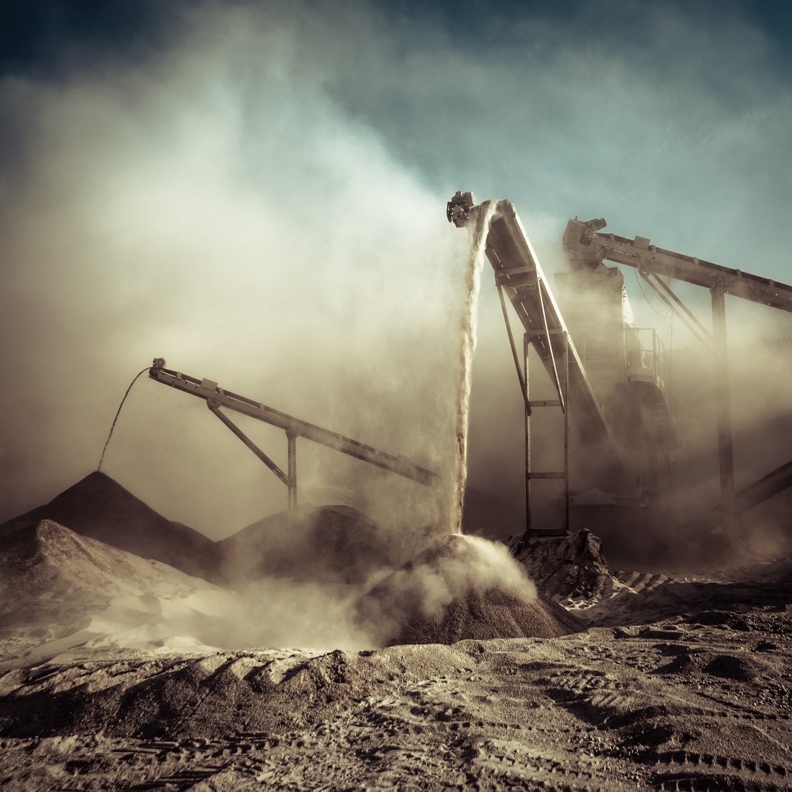 Industrial background with working gravel crusher